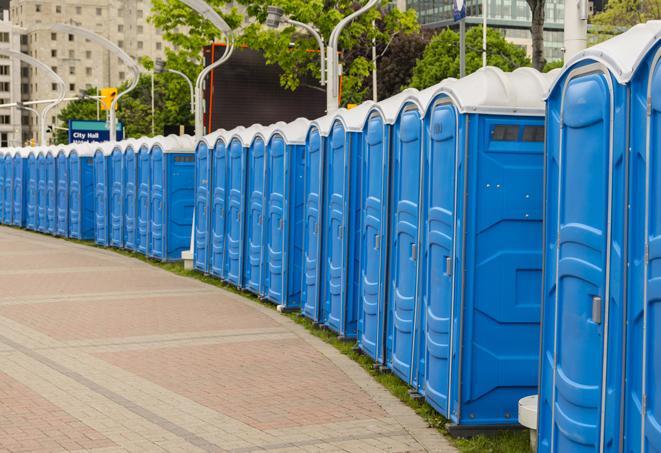 a line of portable restrooms at an outdoor wedding, catering to guests with style and comfort in Berkeley CA